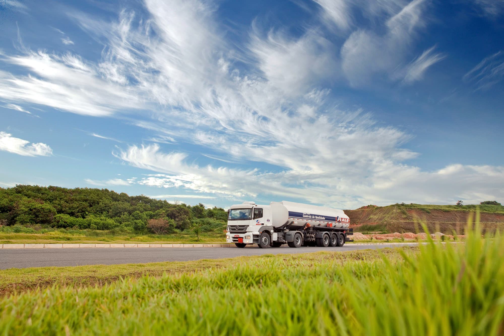 Fuel tanker travelling along a rural road